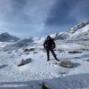 Trekker with guide in Himalayas